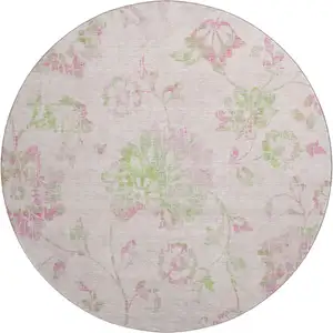 Photo of 8' Pink And Green Floral Washable Round Rug With UV Protection