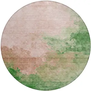 Photo of 8' Pink And Green Round Abstract Washable Indoor Outdoor Area Rug