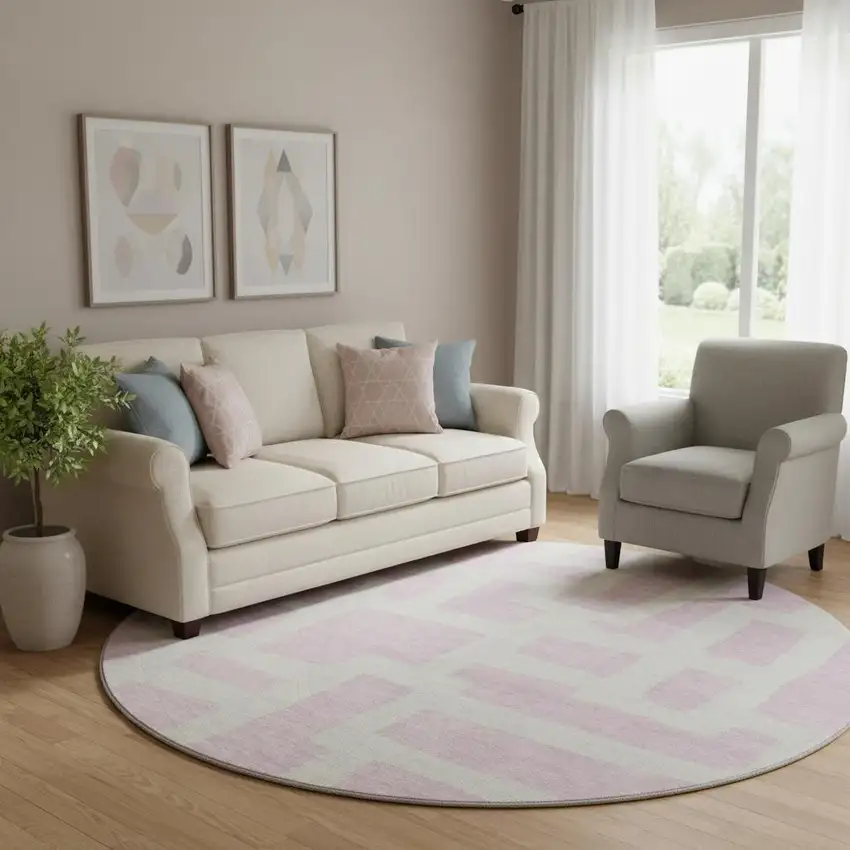 8' Pink And Ivory Abstract Geometric Washable Round Rug With UV Protection Photo 1