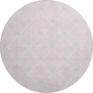 Photo of 8' Pink And Ivory Abstract Geometric Washable Round Rug With UV Protection