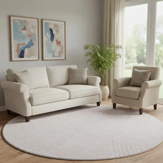 8' Pink And Ivory Abstract Geometric Washable Round Rug With UV Protection Photo 1