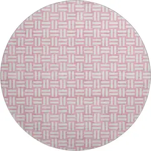 Photo of 8' Pink And Ivory Abstract Geometric Washable Round Rug With UV Protection