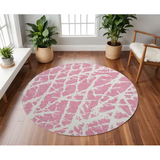 8' Pink And Ivory Abstract Washable Round Rug With UV Protection Photo 2