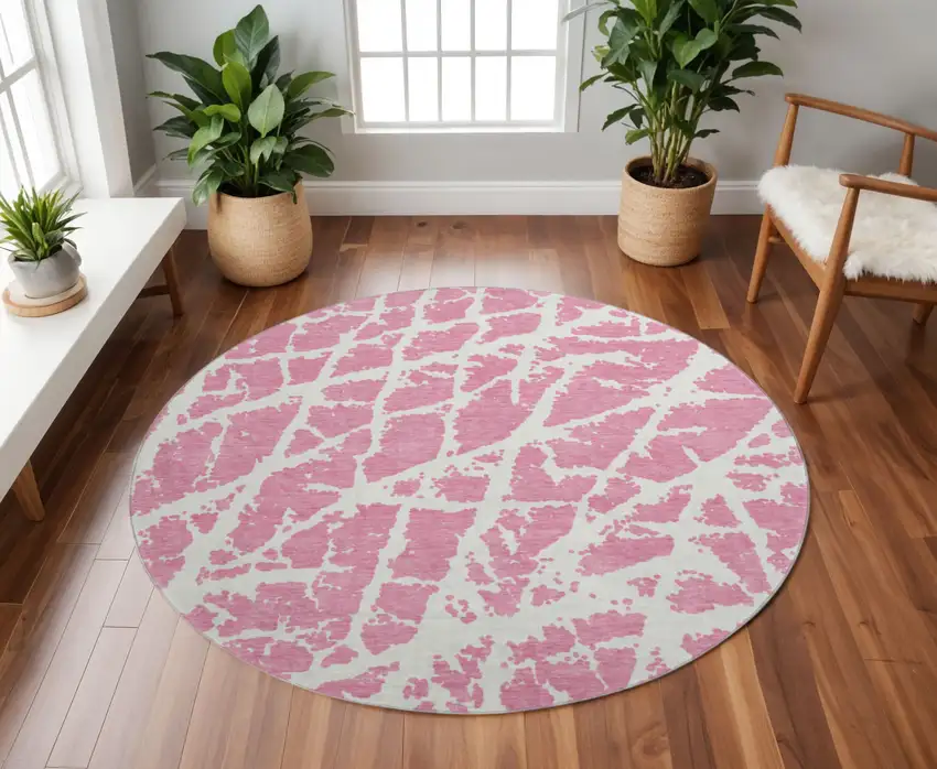 8' Pink And Ivory Abstract Washable Round Rug With UV Protection Photo 2