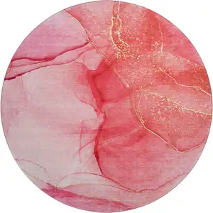 Photo of 8' Pink And Ivory Abstract Washable Round Rug With UV Protection