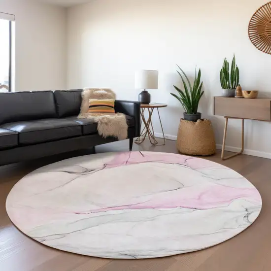 8' Pink And Ivory Abstract Washable Round Rug With UV Protection Photo 6