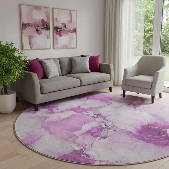 8' Pink And Ivory Abstract Washable Round Rug With UV Protection Photo 1