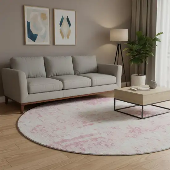 8' Pink And Ivory Abstract Washable Round Rug With UV Protection Photo 2