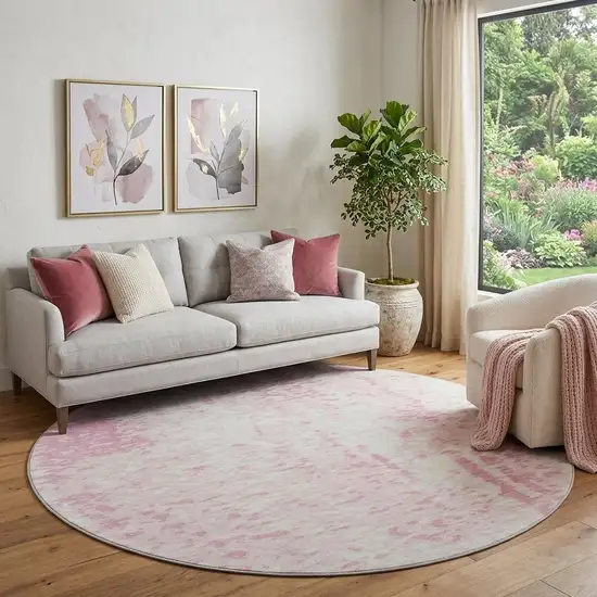 8' Pink And Ivory Abstract Washable Round Rug With UV Protection Photo 1
