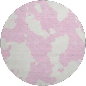 Photo of 8' Pink And Ivory Abstract Washable Round Rug With UV Protection