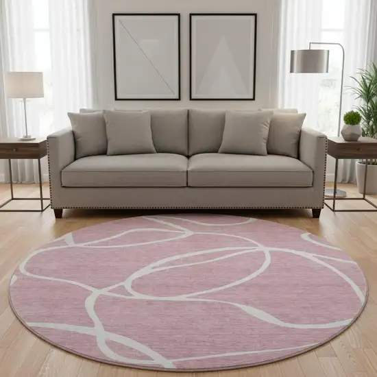 8' Pink And Ivory Abstract Washable Round Rug With UV Protection Photo 2