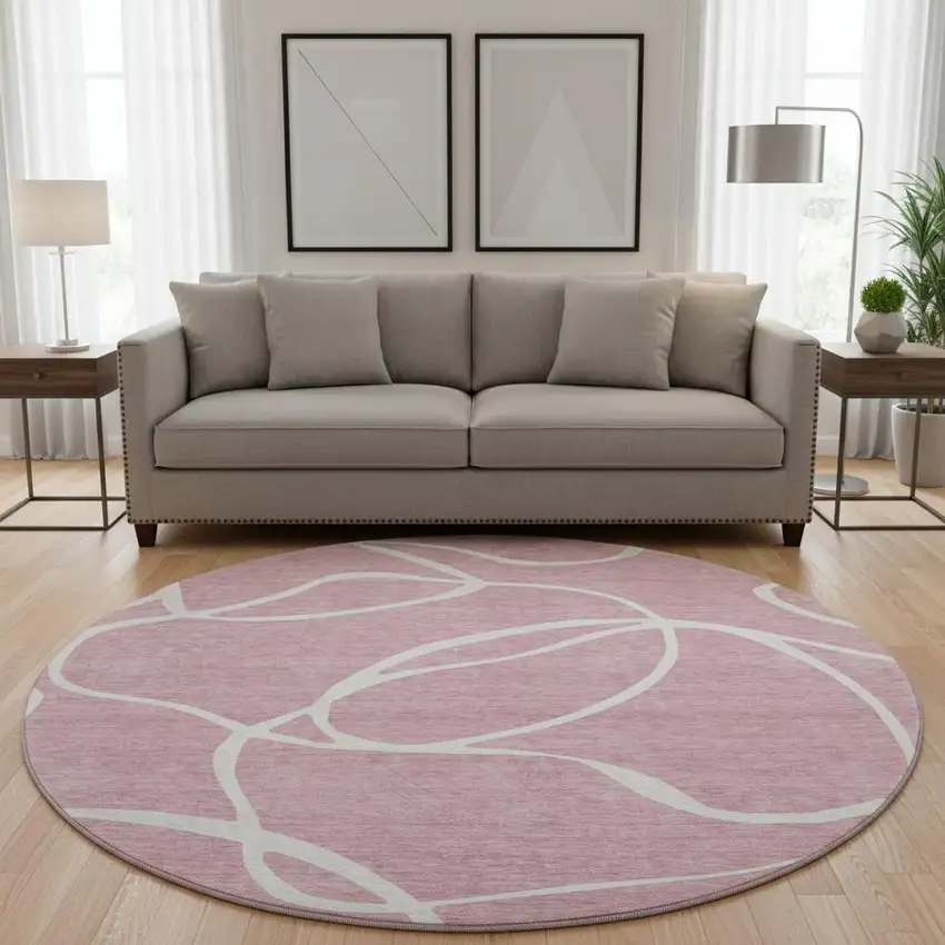8' Pink And Ivory Abstract Washable Round Rug With UV Protection Photo 2