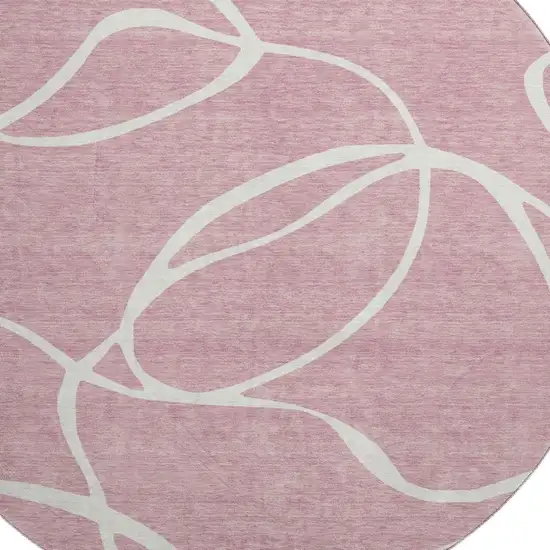 8' Pink And Ivory Abstract Washable Round Rug With UV Protection Photo 2