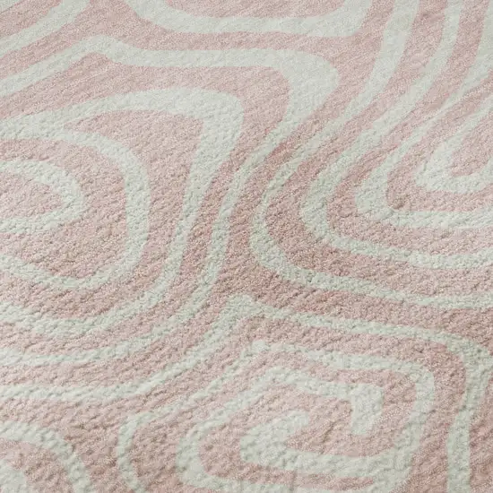 8' Pink And Ivory Abstract Washable Round Rug With UV Protection Photo 8