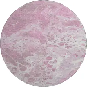 Photo of 8' Pink And Ivory Abstract Washable Round Rug With UV Protection