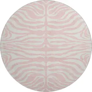 Photo of 8' Pink And Ivory Animal Print Washable Round Rug With UV Protection