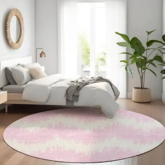 8' Pink And Ivory Chevron Washable Round Rug With UV Protection Photo 5