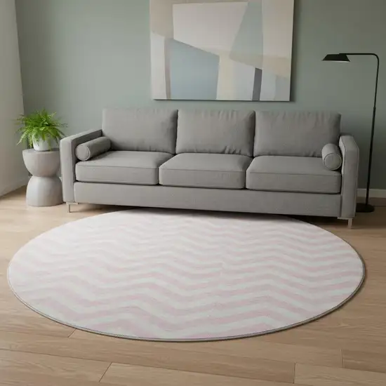 8' Pink And Ivory Chevron Washable Round Rug With UV Protection Photo 2
