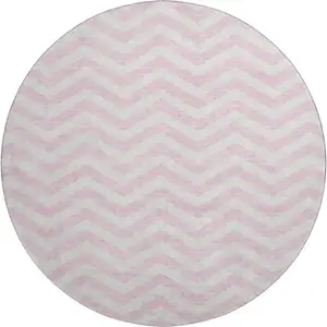 Photo of 8' Pink And Ivory Chevron Washable Round Rug With UV Protection