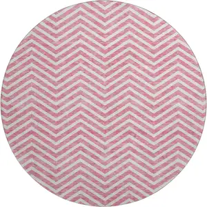 Photo of 8' Pink And Ivory Chevron Washable Round Rug With UV Protection