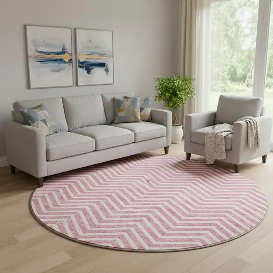 8' Pink And Ivory Chevron Washable Round Rug With UV Protection Photo 1