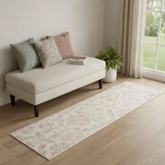 6' Pink And Ivory Damask Distressed Runner Rug Photo 1