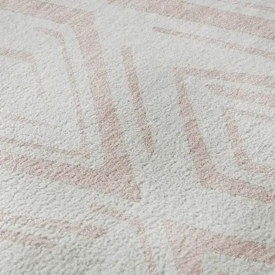 8' Pink And Ivory Diamond Washable Round Rug With UV Protection Photo 9