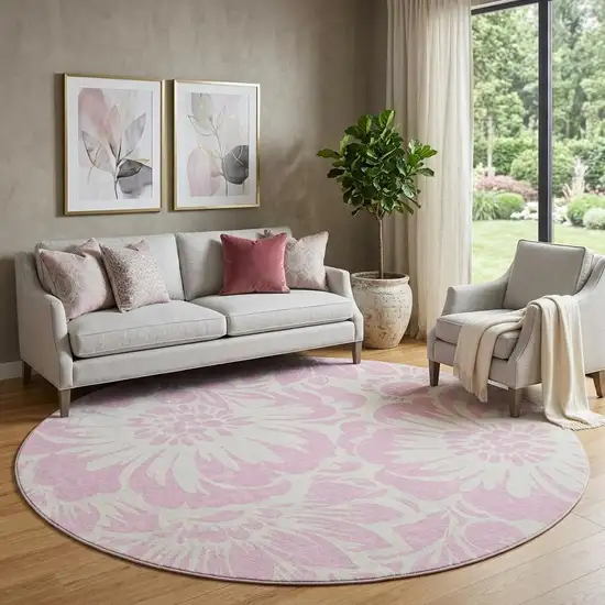 8' Pink And Ivory Floral Washable Round Rug With UV Protection Photo 1