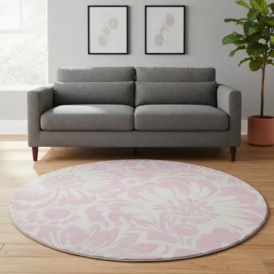 8' Pink And Ivory Floral Washable Round Rug With UV Protection Photo 1
