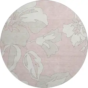Photo of 8' Pink And Ivory Floral Washable Round Rug With UV Protection