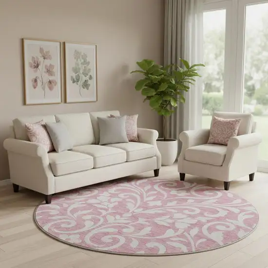 8' Pink And Ivory Floral Washable Round Rug With UV Protection Photo 1
