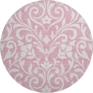 Photo of 8' Pink And Ivory Floral Washable Round Rug With UV Protection