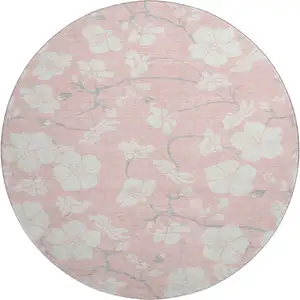 Photo of 8' Pink And Ivory Floral Washable Round Rug With UV Protection