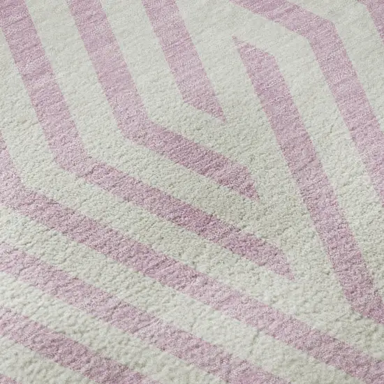 8' Pink And Ivory Geometric Washable Round Rug With UV Protection Photo 9