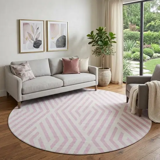 8' Pink And Ivory Geometric Washable Round Rug With UV Protection Photo 1