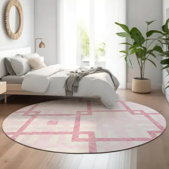8' Pink And Ivory Geometric Washable Round Rug With UV Protection Photo 4
