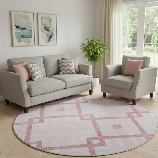 8' Pink And Ivory Geometric Washable Round Rug With UV Protection Photo 1