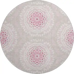 Photo of 8' Pink And Ivory Geometric Washable Round Rug With UV Protection