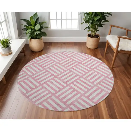 8' Pink And Ivory Geometric Washable Round Rug With UV Protection Photo 2
