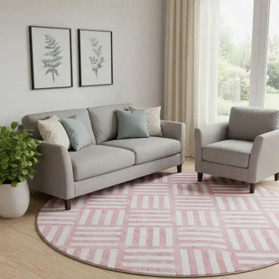 8' Pink And Ivory Geometric Washable Round Rug With UV Protection Photo 1