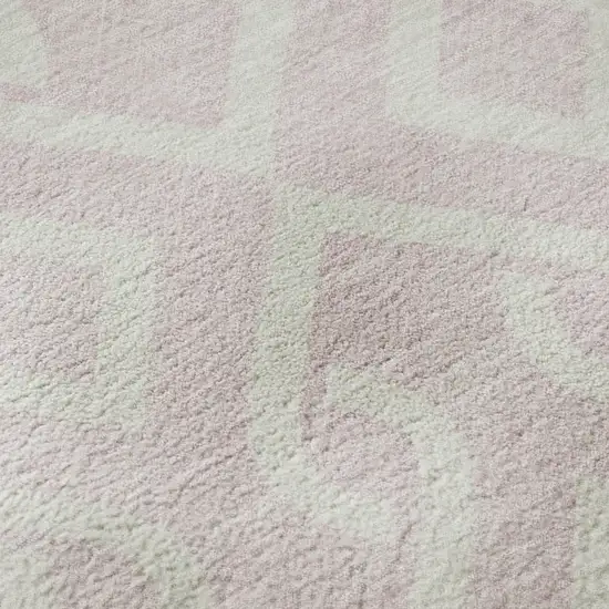 8' Pink And Ivory Geometric Washable Round Rug With UV Protection Photo 9