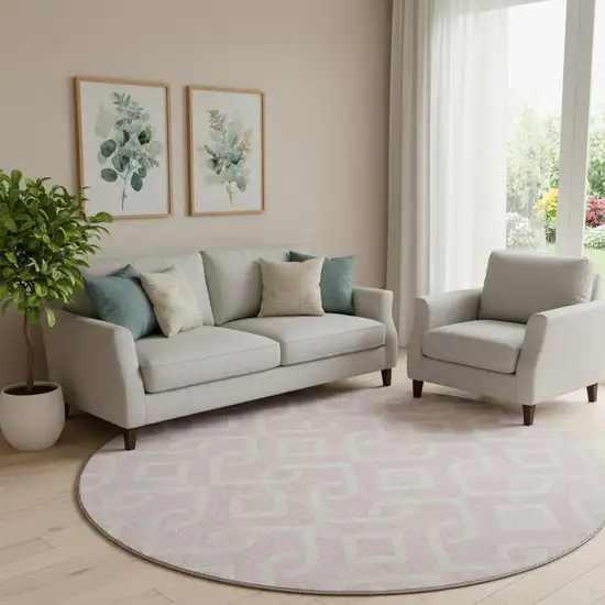 8' Pink And Ivory Geometric Washable Round Rug With UV Protection Photo 1