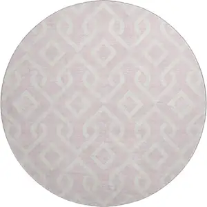 Photo of 8' Pink And Ivory Geometric Washable Round Rug With UV Protection