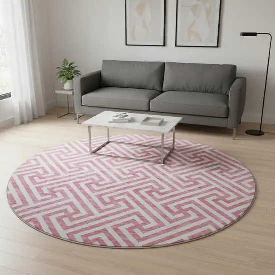 8' Pink And Ivory Geometric Washable Round Rug With UV Protection Photo 2