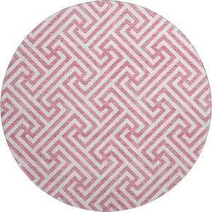 Photo of 8' Pink And Ivory Geometric Washable Round Rug With UV Protection