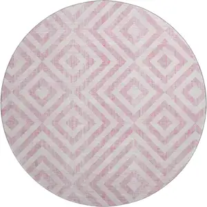 Photo of 8' Pink And Ivory Geometric Washable Round Rug With UV Protection