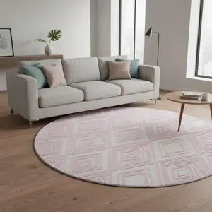 Photo of 8' Pink And Ivory Geometric Washable Round Rug With UV Protection