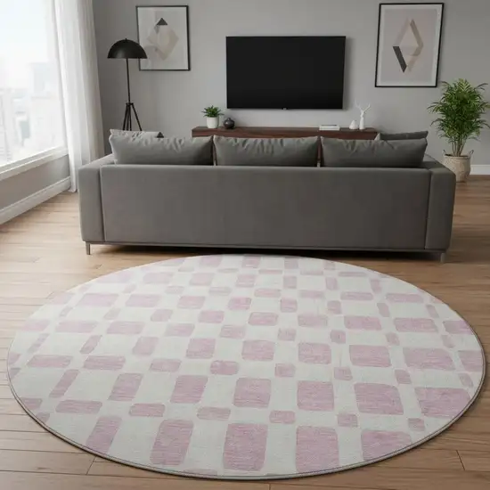 8' Pink And Ivory Geometric Washable Round Rug With UV Protection Photo 2