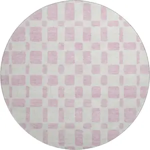 Photo of 8' Pink And Ivory Geometric Washable Round Rug With UV Protection