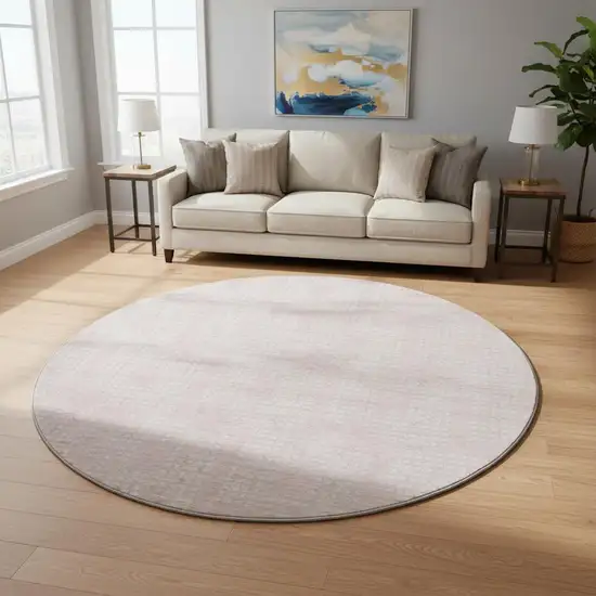 8' Pink And Ivory Geometric Washable Round Rug With UV Protection Photo 2